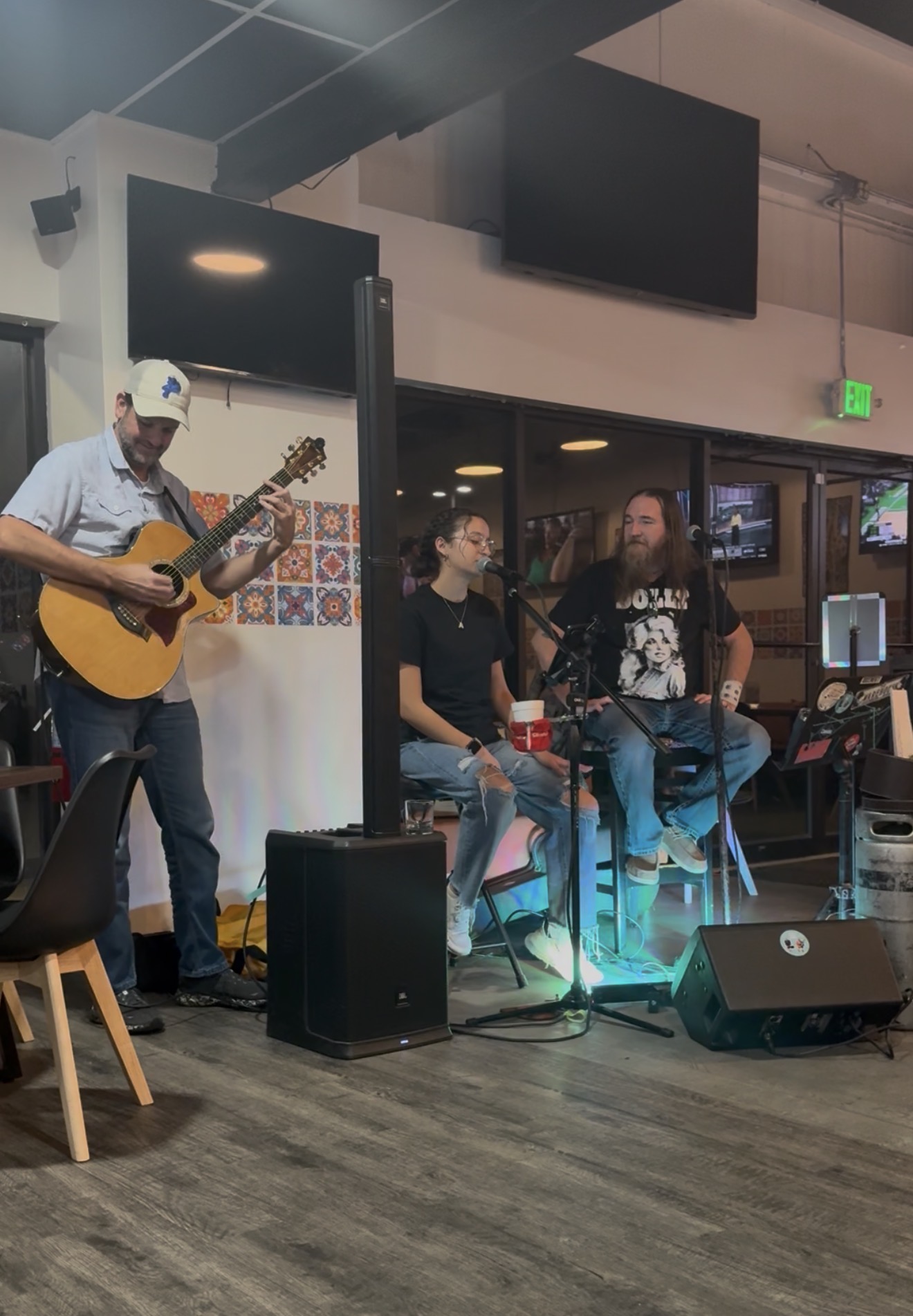 Acoustic trio performing at Bar-Celona